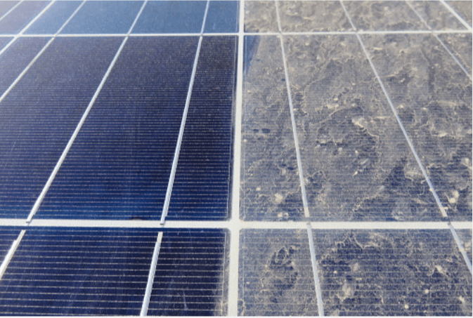 Dirty and clean solar panels side by side